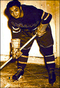 Larry Kwong, with the New York Rangers.